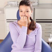 Woman Nervous in Dental Chair